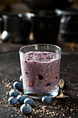 Dessert of chia seeds, cacao nibs and blueberries