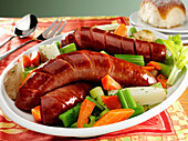 Traditional Polish Kielbasa boiled dinner with carrots, celery and potatoes