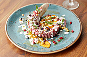 Octopus, chickpeas and pomegranate