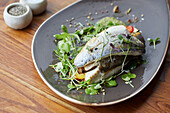 Seabass fillet, watercress and micro herbs