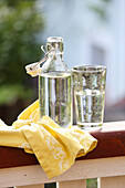 Bottle and glass with water