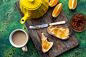 Slice of bread with orange marmalade for tea