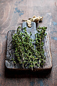 Thyme on a wooden board