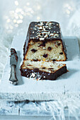 Christmas cake with candied fruit and chocolate icing