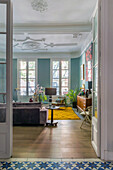 View into the old living room with light blue walls