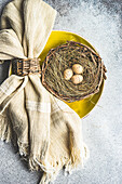 Easter minimalistic place setting on concrete background