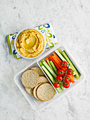 Sweet potato hummus with vegetable stocks and crackers