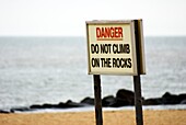 Rock climbing warning sign