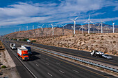 Traffic passing a wind farm