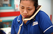 Nurse speaking on the telephone