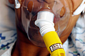 Woman wearing oxygen mask