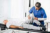 Physiotherapist and patient