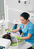 Dentist administering nitrous oxide