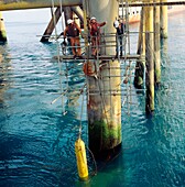Riggers on North Sea oil platform