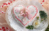 Heart-shaped Valentine's Day cake, with sugared rose petals