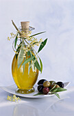 Olive oil, olive flowers. and oil cured olives