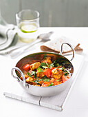 Chicken Balti (chicken curry, India) with spinach and tomatoes