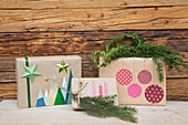 Christmas presents with DIY wrapping and fir branches