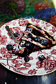 A piece of blueberry jam tart