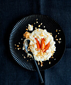 Rice pudding with apricots, honey and coconut crunch