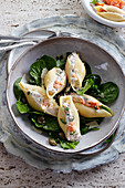 Pasta shells stuffed with cottage cheese and smoked salmon