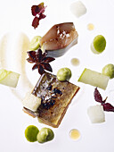 Raw mackerel pieces with green apple