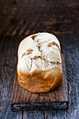 White homemade bread on a wooden background