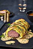 Veal fillet in a potato and spring onion crust