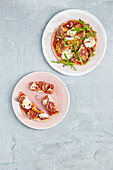Mini pizzas with sweet potatoes, rocket and figs