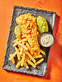 Fish and chips with mayonnaise and pea puree