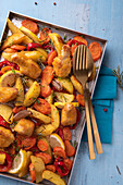 Oven-roasted vegetables with vegan chicken wings (made from soy protein)