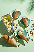 Homemade pistachio icecream with ice cream cones