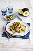 Grilled tuna with avocado, grapefruit and chilli salsa