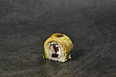 Japanese sushi roll with rice avocado cream cheese placed