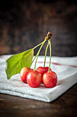 Cherries on kitchen Cloth