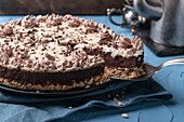 Vegan chocolate mousse cake with biscuit base