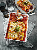 Cannelloni with minced meat filling and tomato sauce