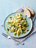 Pasta salad with penne, lemon pesto, and cashew nuts