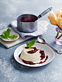 Italian rice pudding with blackberry compote