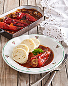 Stuffed red peppers with napkin dumplings