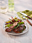 Grilled lamb with herb stuffing and salad