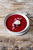 Beetroot soup with horseradish and thistles