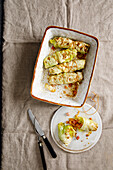 Pointed cabbage roulades with bacon, pumpkin and pear
