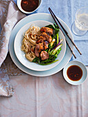 Roasted duck with Asian noodles and vegetables