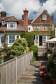 Brick house exterior and garden balcony in Arundel, West Sussex