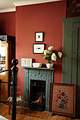 Embroidered fireguard in bedroom of Brighton home, UK