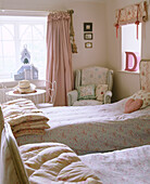 Pair of single beds in country style bedroom