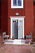 Front door entrance of traditionally Swedish timber house