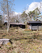 An exterior view of traditional wooden Scandinavian style summerhouses