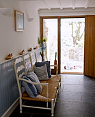 Bench seat in country style hallway